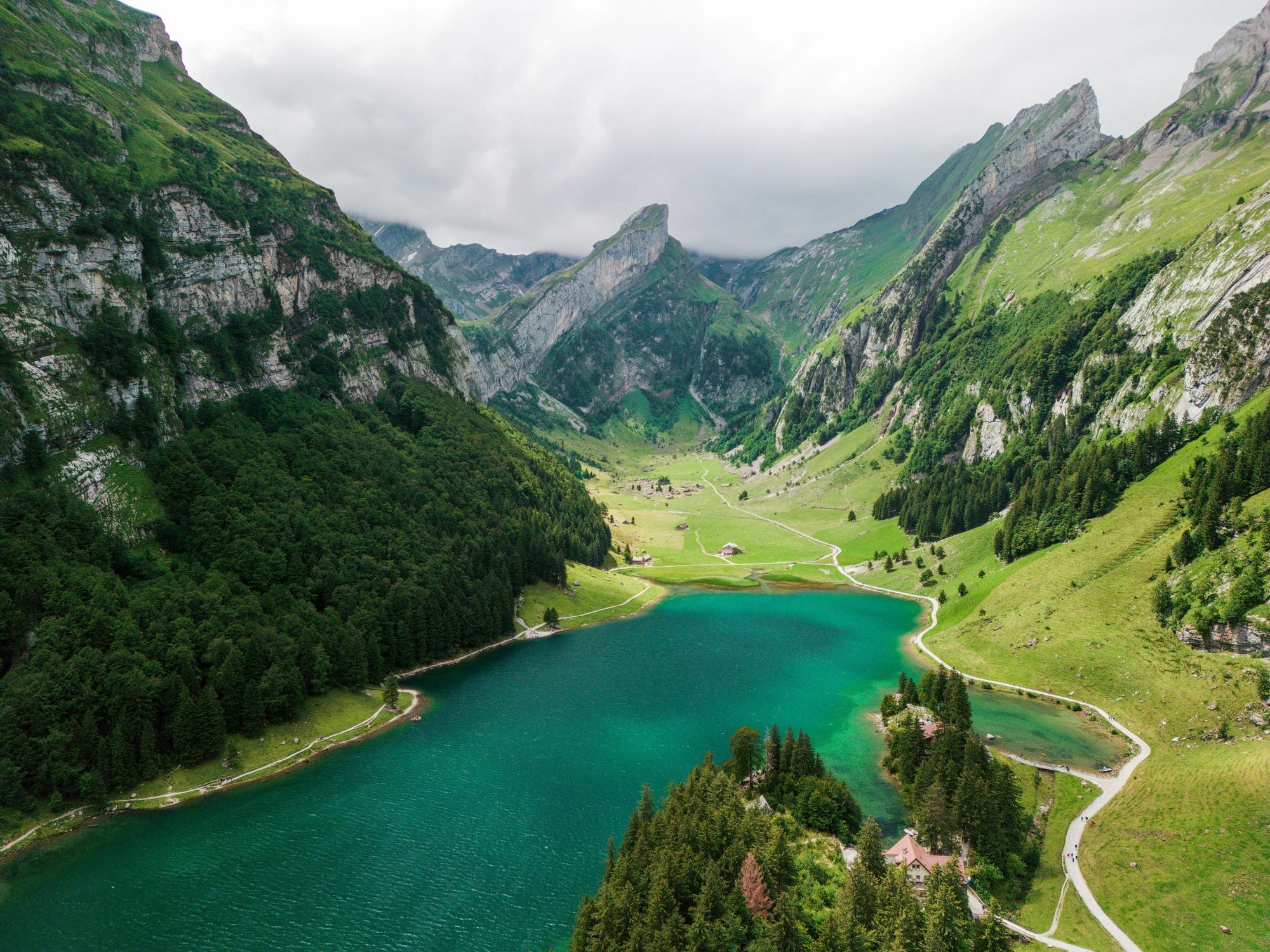 Aerial view of an alpine lake and mountains