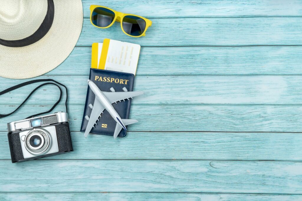 Flat lay of travel accesories composition for summer vacation.